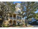 Charming three-story townhouse with balconies and well-maintained landscaping at 6030 Printery St # 108, Tampa, FL 33616
