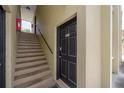 Exterior view of the building with stairwell access to the upper level units at 3206 W Azeele St # 129, Tampa, FL 33609