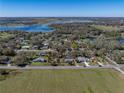 Enjoy the scenic beauty of this home nestled near tranquil lakes and lush greenery, under the sunny sky at 10925 Fort King Rd, Dade City, FL 33525