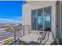 Balcony with comfortable seating offering stunning water views and city skyline at 449 S 12Th St # 2702, Tampa, FL 33602
