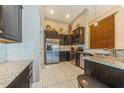 Well-equipped kitchen with stainless steel appliances, granite countertops, and ample cabinet space at 7001 Interbay Blvd # 181, Tampa, FL 33616