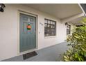 Close-up of the front door and entryway of the condo at 11800 Park Blvd # 505, Seminole, FL 33772