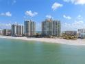 Exterior of beachfront condos along the shoreline, with beautiful views of the ocean and sandy beach at 1560 Gulf Blvd # 1202, Clearwater Beach, FL 33767