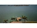 Home features private waterfront dock access and scenic water views at 11697 Grove St, Seminole, FL 33772