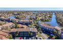 Scenic aerial view showcasing the community's waterfront location and lush landscaping at 6312 Newtown Cir # 12A5, Tampa, FL 33615