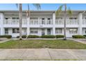 Charming two-story condo with well-manicured lawn and freshly painted exterior at 211 Brandy Wine Dr # 211, Largo, FL 33771