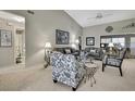 Inviting living room with plush seating, modern decor, and an open layout at 2343 Hidden Trail Dr, Spring Hill, FL 34606