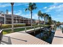 Waterfront home featuring a private boat dock with lift along the canal, ideal for boating enthusiasts at 5815 Dory Way, Tampa, FL 33615