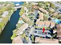 Aerial view of condos close to community pool and marina at 6308 Newtown Cir # 8A3, Tampa, FL 33615
