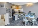 Cozy dining area adjacent to the kitchen, featuring a breakfast bar and open floor plan at 6311 93Rd N Ter # 4403, Pinellas Park, FL 33782