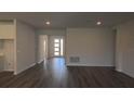 Bright and open living room with views to the front of the home at 17126 James Trl, Parrish, FL 34219