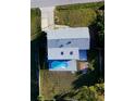 Aerial view of a home featuring a private backyard swimming pool and patio area at 184 Garden Nw Ave, Port Charlotte, FL 33952