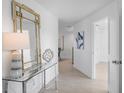 Bright hallway featuring wood floors, modern décor, and ample natural light at 1984 Kansas Ne Ave, St Petersburg, FL 33703