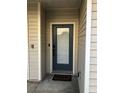 A welcoming front entrance featuring a secure door, doorbell, and a cozy welcome mat at 2900 W Azeele St # H, Tampa, FL 33609