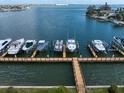 This waterfront home features a private dock and boat lift for easy access to boating and water activities at 5301 Gulf Blvd # C202, St Pete Beach, FL 33706