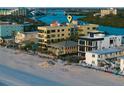 Beautiful beachfront property featuring multiple balconies and coastal architecture at 74 Gulf Blvd # 2B, Indian Rocks Beach, FL 33785