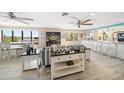 Bright living room with open floor plan and stylish decor at 74 Gulf Blvd # 2B, Indian Rocks Beach, FL 33785
