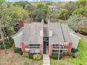 Charming brick condo with cozy screened patios and a lush green lawn at 9100 Dr Martin Luther King Jr N St # 1508, St Petersburg, FL 33702