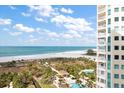 Gorgeous view of the beach and ocean from a high-rise condo balcony at 1200 Gulf Blvd # 906, Clearwater Beach, FL 33767