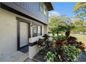 Inviting front entrance with well-maintained landscaping around the door at 2934 Lichen Ln # C, Clearwater, FL 33760