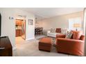 Open-concept living room seamlessly connects to the dining area and the kitchen at 2934 Lichen Ln # C, Clearwater, FL 33760
