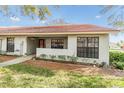 Well maintained single story home with front lawn and manicured landscaping at 2263 Citrus Ct, Clearwater, FL 33763