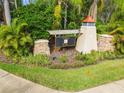 Welcome to Vista Cay! This community offers a landscaped entrance with a stylish sign and inviting atmosphere at 2712 Conch Hollow Dr, Brandon, FL 33511