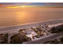 Beautiful beachfront property featuring palm trees, scenic views, and a desirable coastal lifestyle at 3351 Gulf Of Mexico Dr, Longboat Key, FL 34228