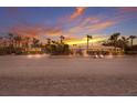Charming beachfront home with a sandy yard, perfect for relaxing and enjoying the ocean breeze at 3351 Gulf Of Mexico Dr, Longboat Key, FL 34228