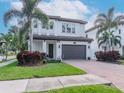 Gorgeous two-story home with a lush yard and a spacious driveway, perfect for families at 4302 W San Pedro St, Tampa, FL 33629