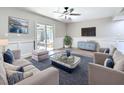 Comfortable living room featuring modern furniture, decor and a sliding door to the patio at 1884 Clearbrooke Dr # 1884, Clearwater, FL 33760