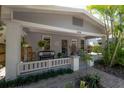 Charming front porch with decorative seating and a cozy atmosphere at 3116 W Wallcraft, Tampa, FL 33611