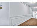 Hallway featuring neutral wall decor and flooring near unit 105 at 855 Bayway Blvd # 105, Clearwater, FL 33767