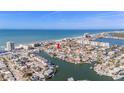 Wonderful location along the beach with harbor access, indicated by red arrow for location purposes at 146 175Th Terrace E Dr, Redington Shores, FL 33708