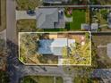 Birds eye view of a single story home with a deck and outlined property lines at 2530 Sunset Dr, Largo, FL 33770