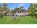Quaint single Gathering home with a lush front yard and inviting curb appeal at 4804 N 10Th St, Tampa, FL 33603