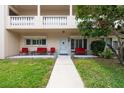 Charming front porch with outdoor seating, creating a cozy and inviting entrance to the home at 2170 Americus S Blvd # 6, Clearwater, FL 33763