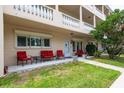 Inviting front porch with comfortable seating, perfect for enjoying the outdoors at 2170 Americus S Blvd # 6, Clearwater, FL 33763