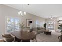 Bright living room with natural light, neutral paint, modern furniture, and a cozy atmosphere at 9808 62Nd N Ter # 9808, St Petersburg, FL 33708