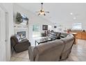 Spacious living room with modern tile flooring and an open layout at 6512 N 24Th St, Tampa, FL 33610
