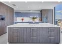 Modern kitchen features custom cabinetry, sleek countertops, and high-end appliances at 301 1St S St # 3103, St Petersburg, FL 33701