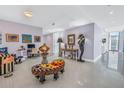 Bright and airy living room with unique furnishings and floor-to-ceiling windows at 301 1St S St # 3103, St Petersburg, FL 33701