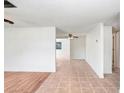 Spacious living room with tile and wood flooring at 5510 Berlin Dr, Port Richey, FL 34668