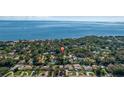 Aerial view of the neighborhood, coastline and bay, showcasing the community's waterfront location at 1130 Serpentine S Dr, St Petersburg, FL 33705
