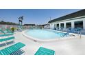 Inviting community pool area with ample seating, clear blue water, and well-maintained facilities at 7847 39Th N Ter, St Petersburg, FL 33709