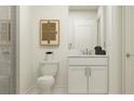 Modern bathroom featuring quartz counters, modern fixtures, and glass-enclosed shower at 4510 S Manhattan Ave # 6, Tampa, FL 33611