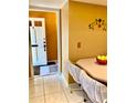 Inviting home entryway featuring tile flooring and a view into a cheerful dining area at 1616 S Lake Ave # 4, Clearwater, FL 33756