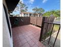 Beautiful, private outdoor tile patio area at 1725 Pine Ridge E Way # C, Palm Harbor, FL 34684