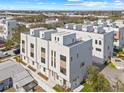 Modern townhouse complex aerial view, showing the rooftop terraces and convenient location near city highways at 305 15Th N St, St Petersburg, FL 33705