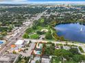 Stunning aerial view of the property near the park, lake, and major roadways at 405 S Lake Dr, Clearwater, FL 33755
